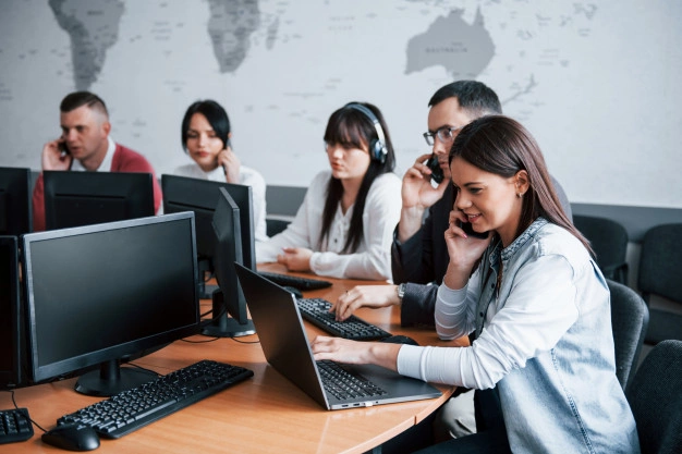 everyone-doing-his-job-young-people-working-call-center-new-deals-is-coming