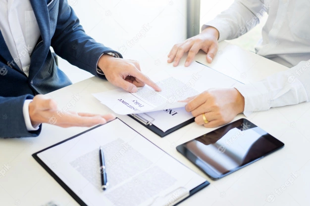 man-signing-car-insurance-policy